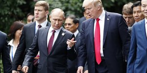 Ο Ντόναλντ Τραμπ και ο Βλαντιμίρ Πούτιν (Φωτογραφία: AP/ Jorge Silva)