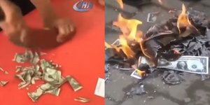 Οι Τούρκοι κομματιάζουν και καίνε δολάρια των ΗΠΑ